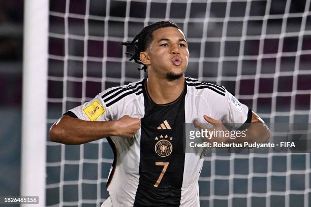 Paris Brunner of Germany celebrates after scoring the team's first goal during the FIFA U-17 World Cup Final match between Germany and France at...