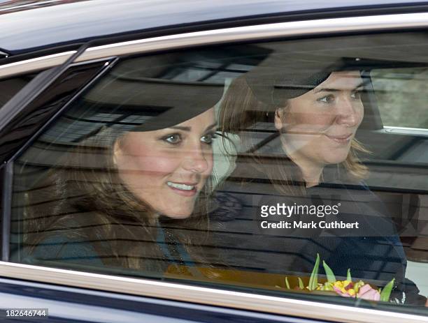 Catherine, Duchess of Cambridge with Rebecca Deacon, during a visit by Queen Elizabeth and Prince Phillip, with Catherine, Duchess of Cambridge to...