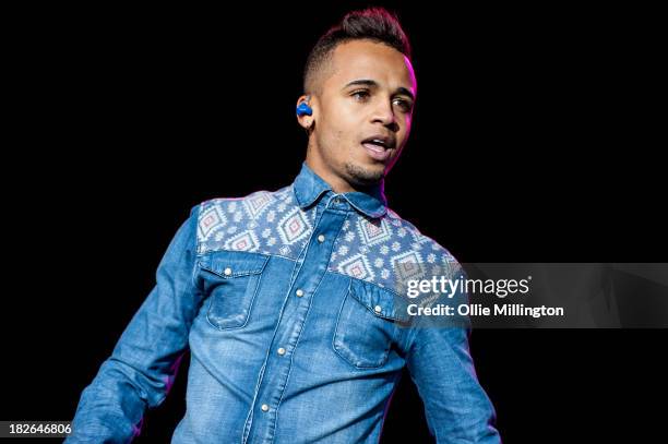 Aston Merrygold of JLS performs on stage on Day 2 of Fusion Festival 2013 at Cofton Park on September 1, 2013 in Birmingham, England.