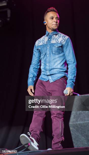 Aston Merrygold of JLS performs on stage on Day 2 of Fusion Festival 2013 at Cofton Park on September 1, 2013 in Birmingham, England.