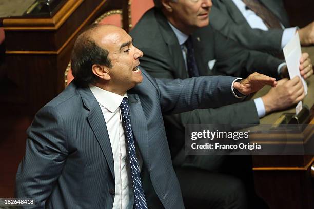 Domenico Scilipoti of PDL attends the confidence vote for Enrico Letta's government at the Italian Senate, Palazzo Madama on October 2, 2013 in Rome,...