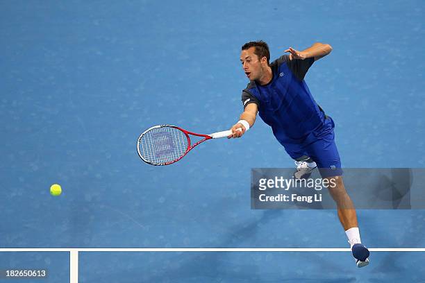 Philipp Kohlschreiber of Germany returns a shot during his men's singles match against Rafael Nadal of Spain on day five of the 2013 China Open at...