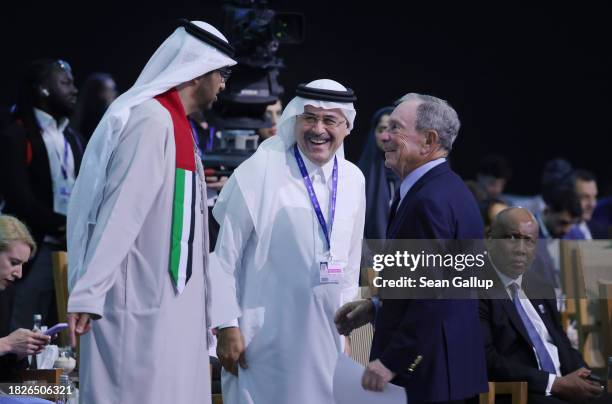 Michael Bloomberg shares a laugh with Sultan Ahmed Al Jaber , President of the UNFCCC COP28 Climate Conference, and Amin Nasser , CEO of Saudi...
