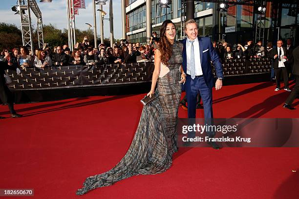 Verona Pooth and Franjo Pooth attend the Deutscher Fernsehpreis 2013 - Red Carpet Arrivals at Coloneum on October 02, 2013 in Cologne, Germany.