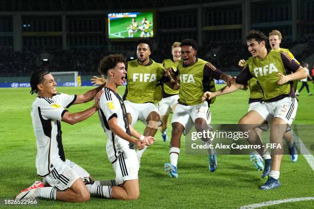 Noah Darvich of Germany celebrates after scoring the team's second goal during the FIFA U-17 World Cup Final match between Germany and France at...