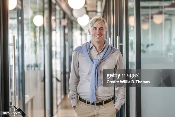Man In Building 7,254 Man In Front Of Office Building Stock Photos, High-Res Pictures ...