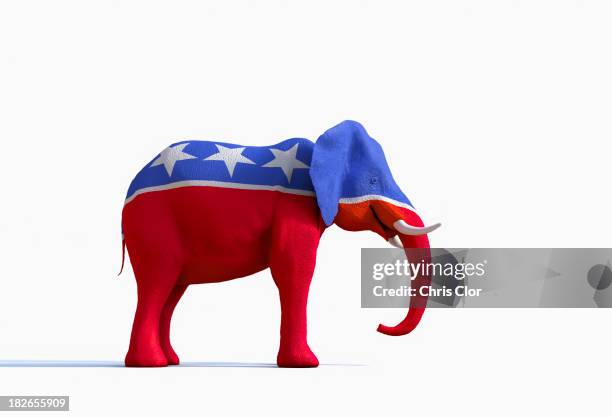 elephant statue painted red, white and blue - elephant stock pictures, royalty-free photos & images