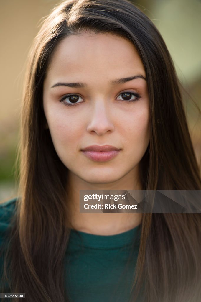 Hispanic woman with worried expression