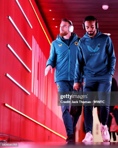 Jose Sa and Matheus Cunha of Wolverhampton Wanderers arrive at the stadium ahead of the Premier League match between Arsenal FC and Wolverhampton...