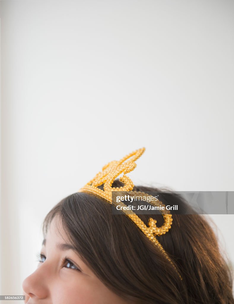 Hispanic girl wearing tiara