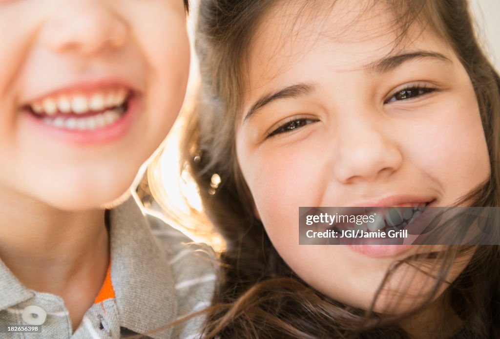 Hispanic children smiling