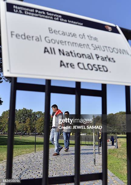 Tourists visit the Vietnam Veterans Memorial in Washington, DC, on October 2 second day of the federal government shutdown. US President Barack Obama...