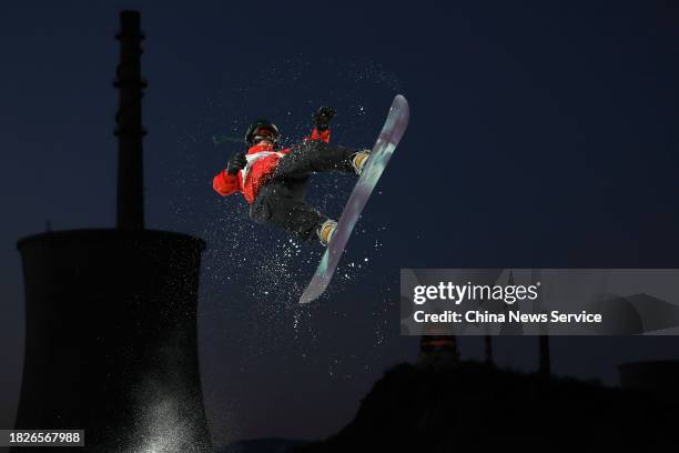 Su Yiming of China competes in the Men's Snowboard Big Air World Cup final at Big Air Shougang on December 2, 2023 in Beijing, China.