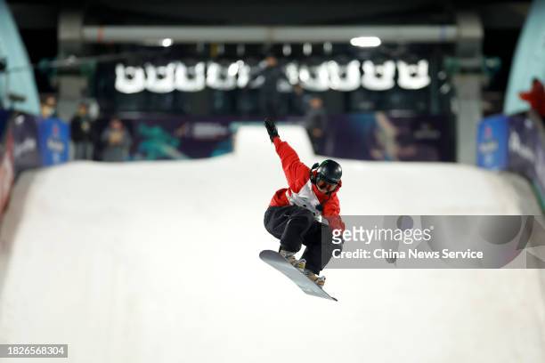 Su Yiming of China competes in the Men's Snowboard Big Air World Cup final at Big Air Shougang on December 2, 2023 in Beijing, China.