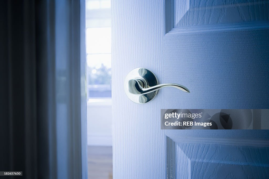 Close up of handle on open door