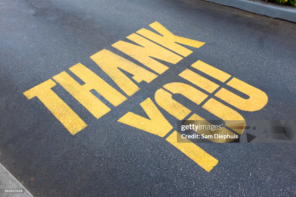 'Thank you' painted on concrete