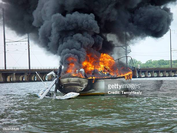 burning sailboat - burning stock pictures, royalty-free photos & images
