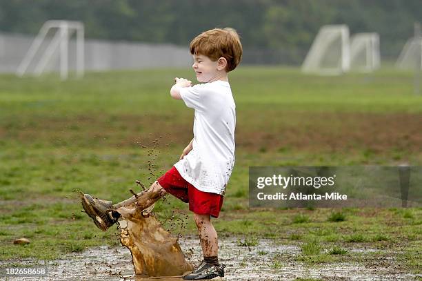 just a little dirty - kids mud stock pictures, royalty-free photos & images