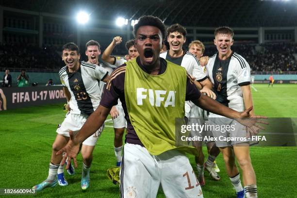 Charles Herrmann of Germany celebrates victory in the penalty shoot out at full-time after the FIFA U-17 World Cup Final match between Germany and...