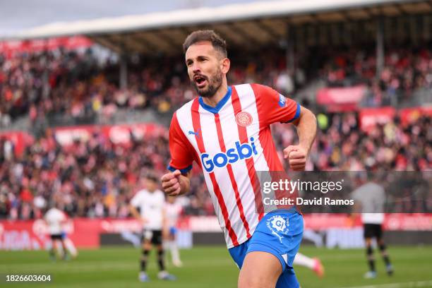 Cristhian Stuani of Girona FC celebrates after scoring the team's first goal during the LaLiga EA Sports match between Girona FC and Valencia CF at...