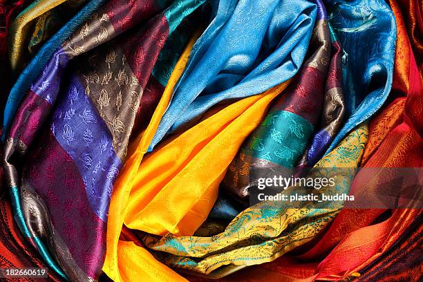 colorful fabrics - sari stock pictures, royalty-free photos & images