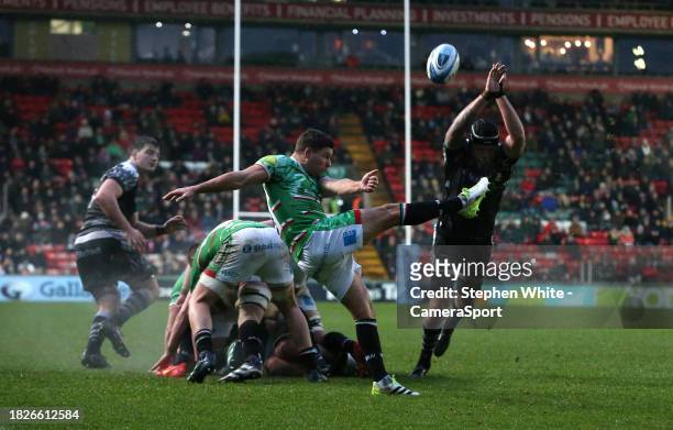 Leicester Tigers' Ben Youngs clears under pressure from Newcastle Falcons' Sebastian de Chaves during the Gallagher Premiership Rugby match between...