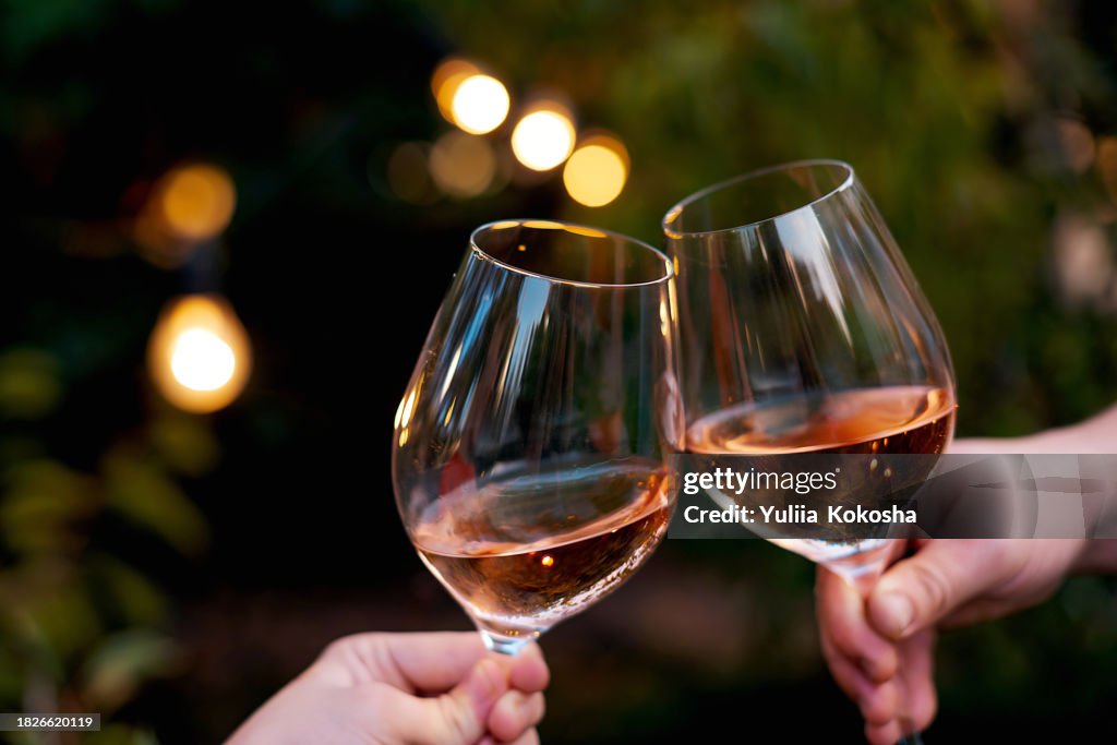 Couple toasting wine glasses