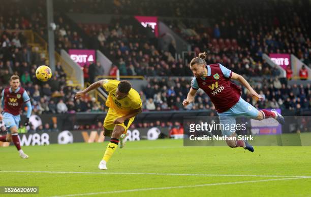Jay Rodriguez of Burnley scores the team's first goal during the Premier League match between Burnley FC and Sheffield United at Turf Moor on...