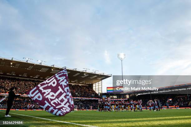 Players of Burnley and Sheffield United line up to shake hands prior to the Premier League match between Burnley FC and Sheffield United at Turf Moor...