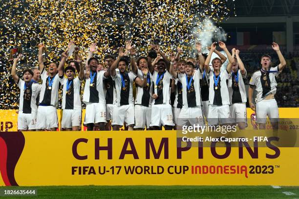 Germany lift the FIFA U-17 World Cup winners trophy following victory in the FIFA U-17 World Cup Final match between Germany and France at Manahan...