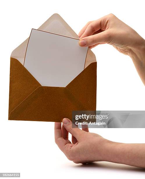 opening envelope - opening envelope stock pictures, royalty-free photos & images
