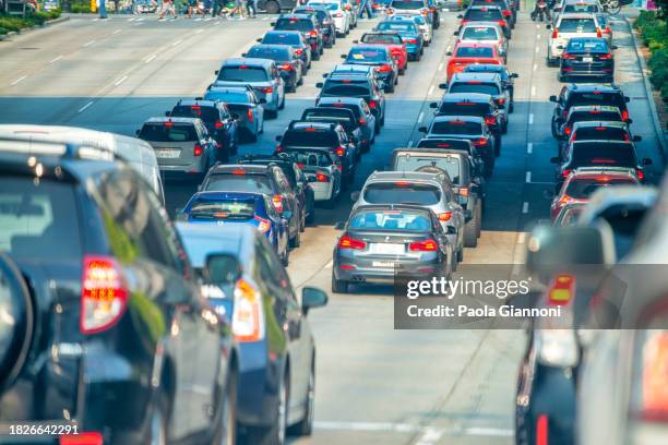 car traffic to the city outskirts - seattle traffic stock pictures, royalty-free photos & images