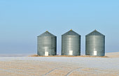 Grain storage in a winter landscape in Alberta,Canada