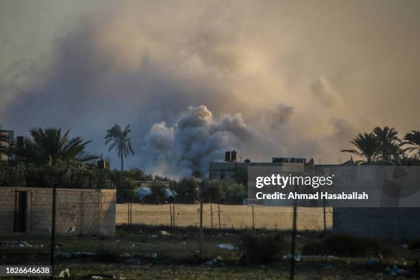 Smoke rises from an explosion on December 02, 2023 in Khan Yunis, Gaza. Israel steps up military operations in Gaza after a sustained truce between...