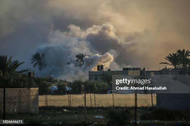 Smoke rises from an explosion on December 02, 2023 in Khan Yunis, Gaza. Israel steps up military operations in Gaza after a sustained truce between...