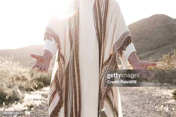 jesus with open arms - robe stockfoto's en -beelden