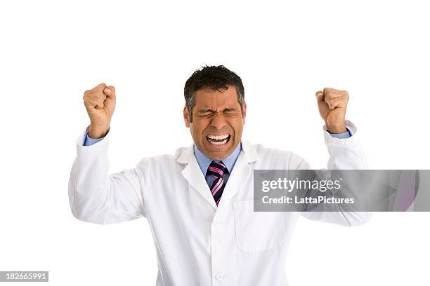 male doctor gesturing with fists in air making face - doctor hat bildbanksfoton och bilder