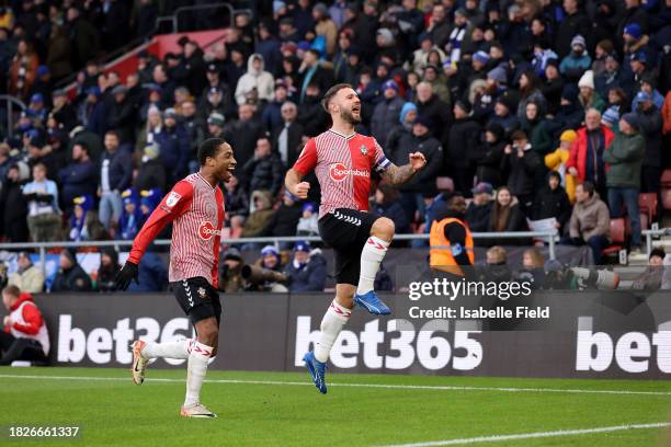Adam Armstrong of Southampton celebrates scoring his second goal during the Sky Bet Championship match between Southampton FC and Cardiff City at...
