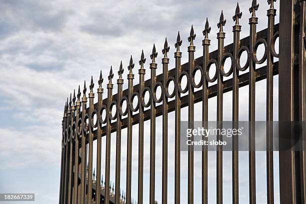 fence curve - guards division stock pictures, royalty-free photos & images