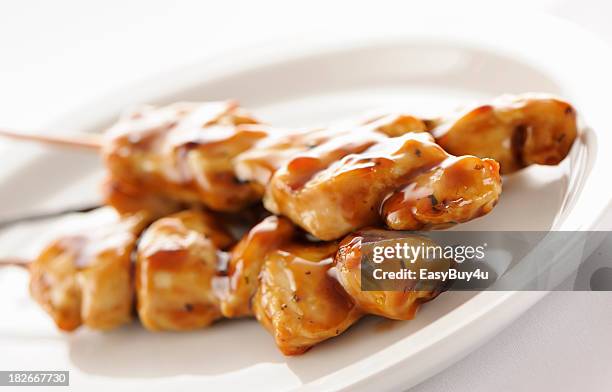 seasoned chicken skewers - satay stock pictures, royalty-free photos & images