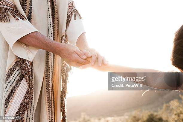 jesus comforting - jesus christ stock pictures, royalty-free photos & images