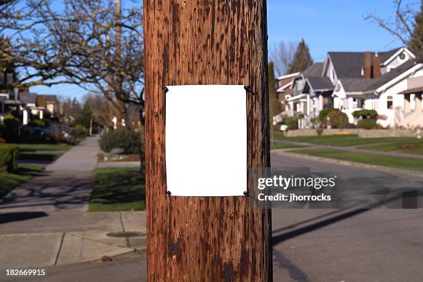 neighborhood post - wooden sign post stockfoto's en -beelden