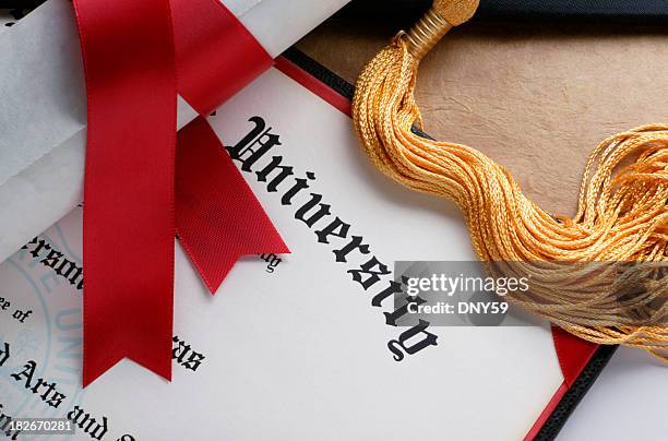 gold tassel and rolled diploma with red ribbon - diploma stock pictures, royalty-free photos & images