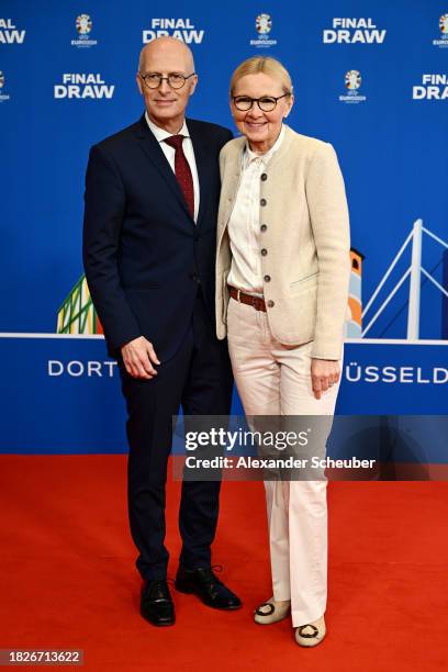 Peter Tschentscher, First Mayor of Hamburg and Partner, Eva-Maria Tschentscher, arrive prior to the UEFA EURO 2024 Final Tournament Draw at...