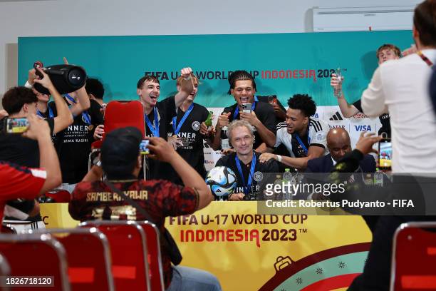 Players of Germany crash a speaks to the media in the post match press conference conference following the FIFA U-17 World Cup Final match between...