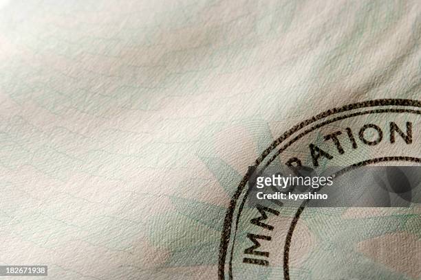 close-up of blank immigration stamp with copy space - emigration and immigration stock pictures, royalty-free photos & images