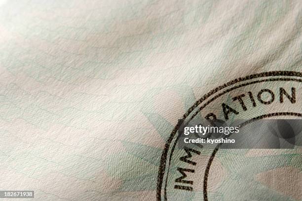 close-up of blank immigration stamp with copy space - migration bildbanksfoton och bilder