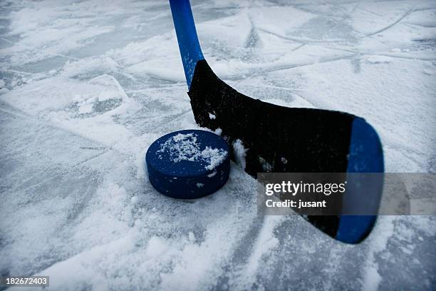 ice-hockey stick 2 - puck stock pictures, royalty-free photos & images