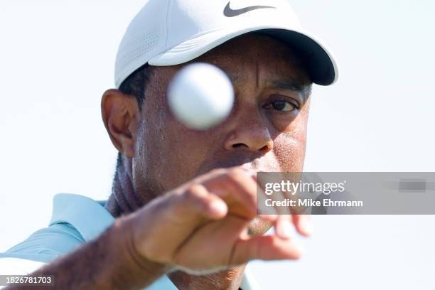 Tiger Woods of the United States warms up on the range during the third round of the Hero World Challenge at Albany Golf Course on December 02, 2023...