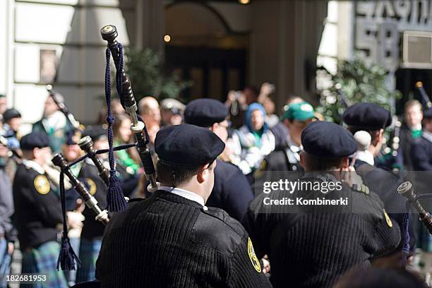 bagpipe from behind - saint patricks day parade stock pictures, royalty-free photos & images